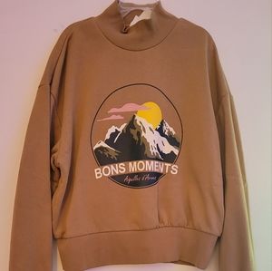 Zara kids cropped turtle neck sweater. Brown with a graphic